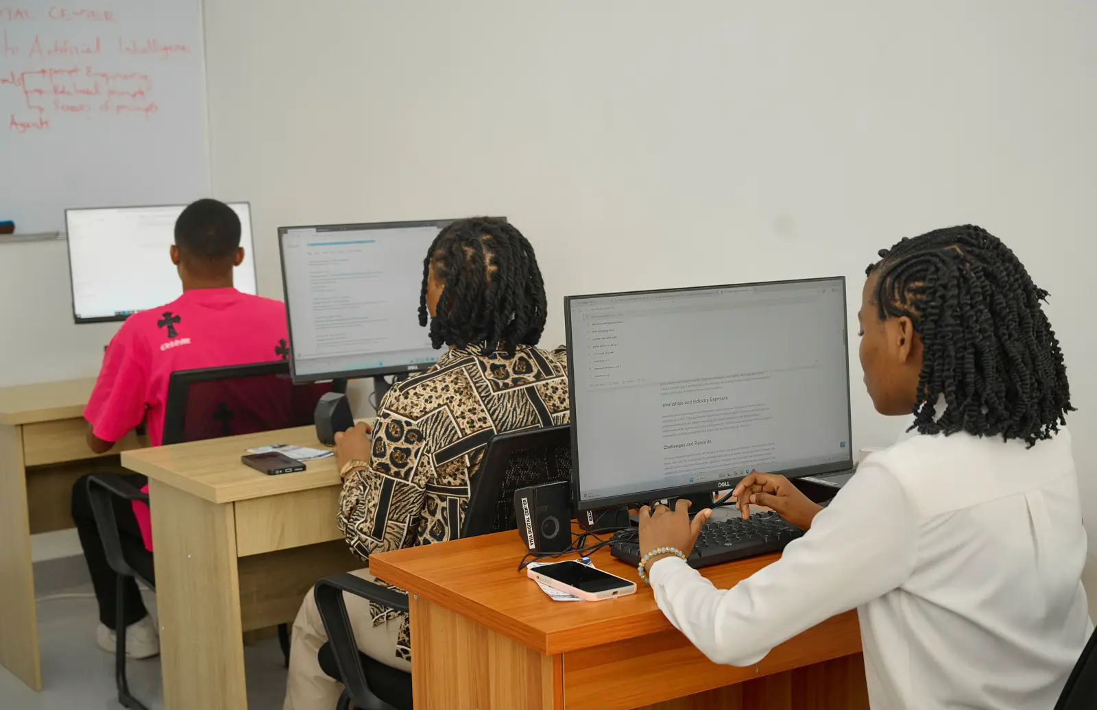 Trainees working on computers during a class at VIVA Digital Center
