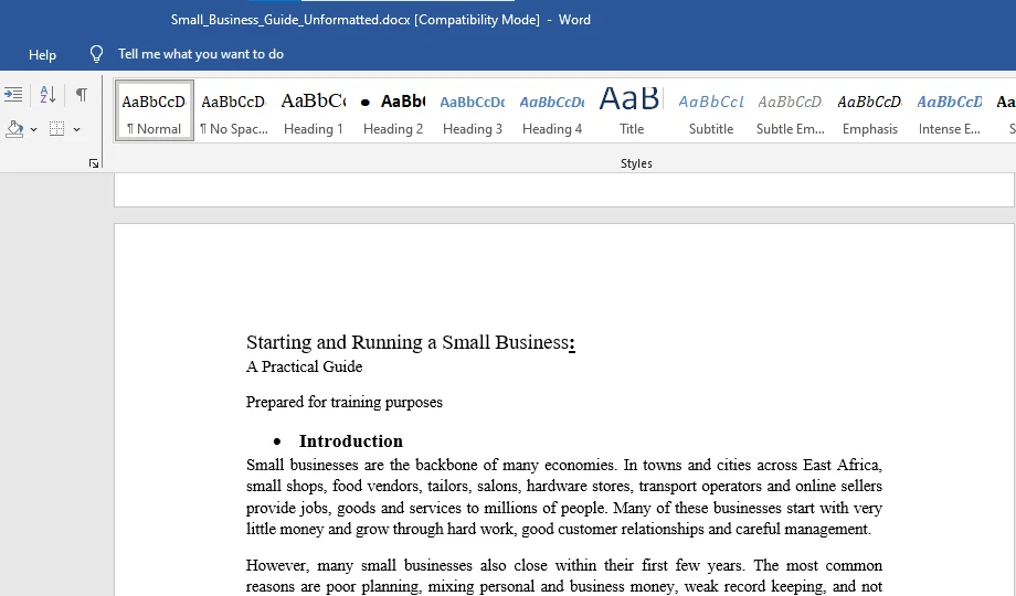 A business guide being formatted in Microsoft Word, with headings and styles